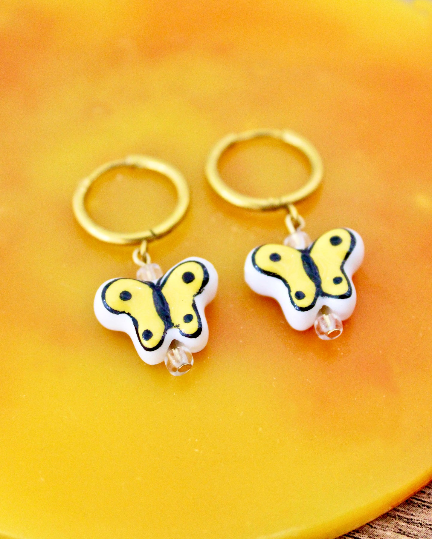 Ceramic Butterfly - Gold Stainless Steel Huggies
