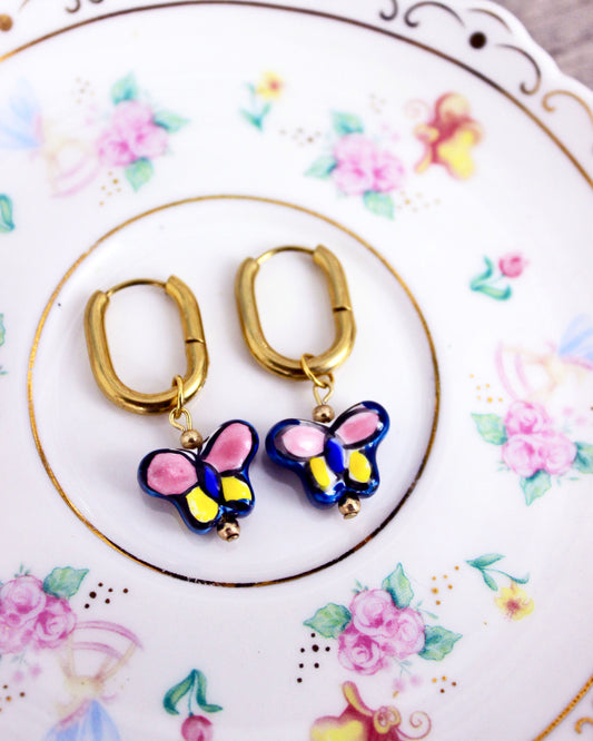 Ceramic Butterfly - Gold Stainless Steel Huggies